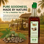 Nandi's Blessing pure bull-pressed castor oil bottle displayed beside raw castor seeds and leaves.