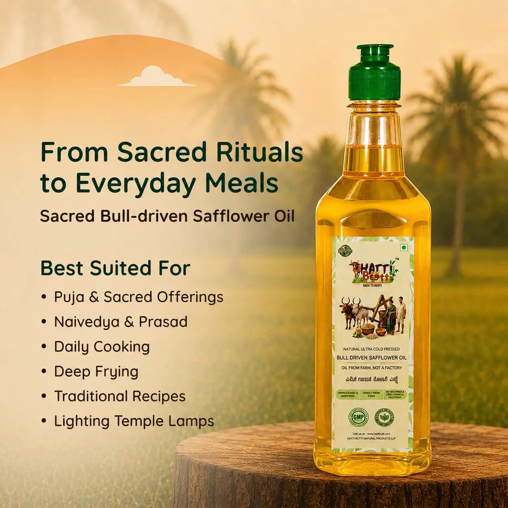 Nandi's Blessing safflower oil bottle placed on a wooden log in a scenic rural landscape, suited for cooking and temple lamps.