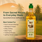 Nandi's Blessing safflower oil bottle placed on a wooden log in a scenic rural landscape, suited for cooking and temple lamps.